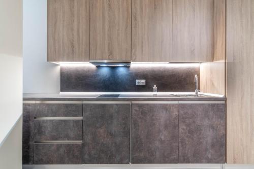 O bucătărie sau chicinetă la Tarifa Suites by QHotels
