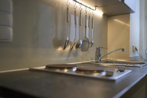 Kuchyň nebo kuchyňský kout v ubytování Apartments Deutschmeister