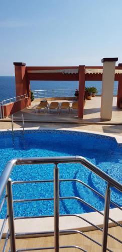 a swimming pool on top of a building at Apartment Sea Space 2 in Dobra Voda