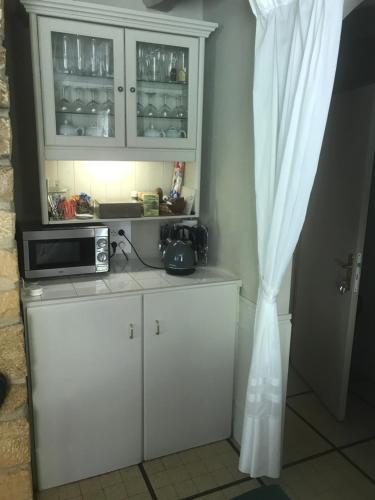 Η κουζίνα ή μικρή κουζίνα στο Bed & Breakfast Le Moulin Neuf