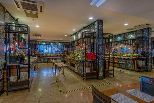 Een restaurant of ander eetgelegenheid bij Amara Comfort Resort