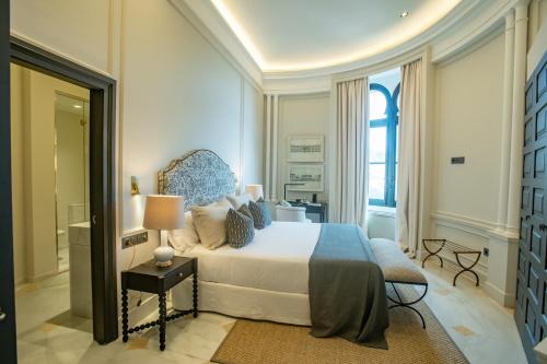 Postel nebo postele na pokoji v ubytování Soho Boutique Castillo de Santa Catalina - Adults Recommended