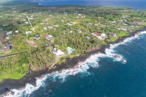 an aerial view of an island in the ocean at Hale Ki'i Maka Manu home in Keaau