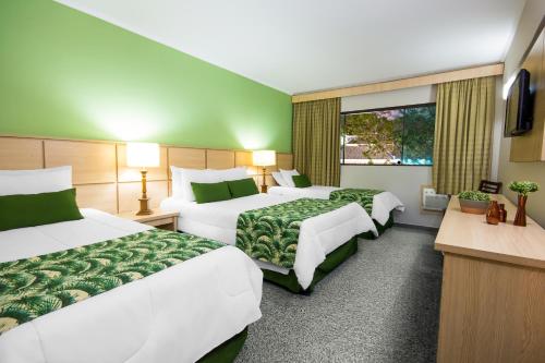 Postel nebo postele na pokoji v ubytování Thermas All Inclusive Resort Poços de Caldas By Nacional Inn
