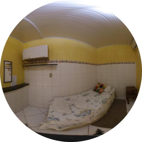 Ένα ή περισσότερα κρεβάτια σε δωμάτιο στο Chapada Casas da Izete