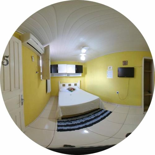 Ένα ή περισσότερα κρεβάτια σε δωμάτιο στο Chapada Casas da Izete