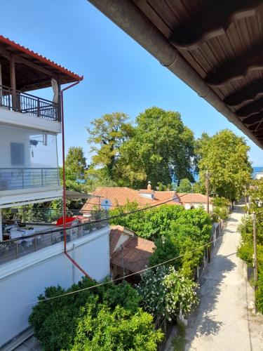 a view from the balcony of a house at Niki Apartments Beach Loft in Platamonas