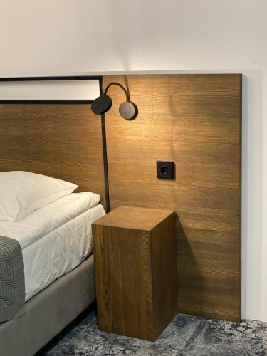 Ένα ή περισσότερα κρεβάτια σε δωμάτιο στο Altrimo Hotel
