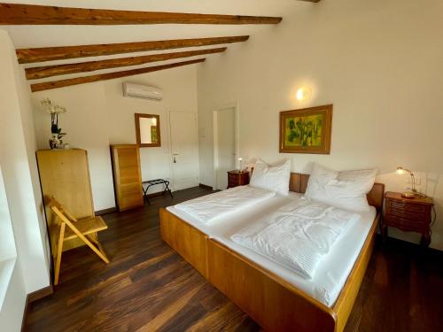 Postel nebo postele na pokoji v ubytování Casa Bea