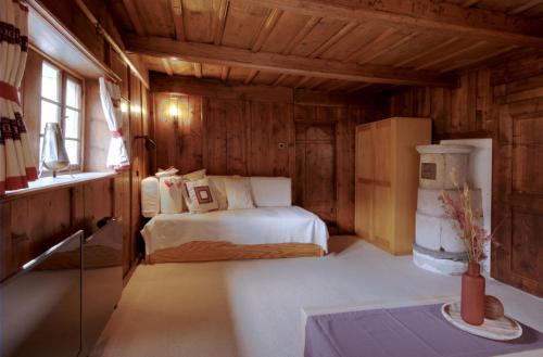 Postel nebo postele na pokoji v ubytování Charmant appartement avec cachet de l'ancien