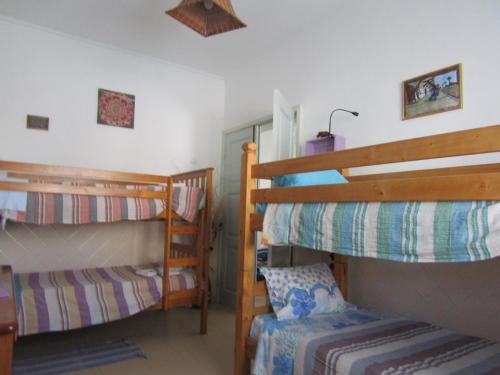 Ένα ή περισσότερα κρεβάτια σε δωμάτιο στο West Coast Surf Hostel