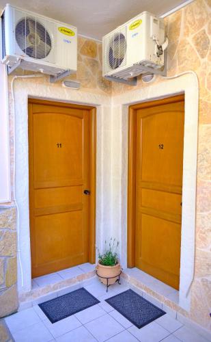 Imagen de la galería de Houmis Apts & Studios, en Agios Georgios Pagon