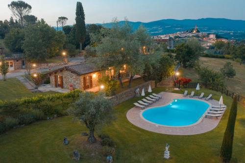 an estate with a swimming pool and a house at Podere Cerretino in Poppi