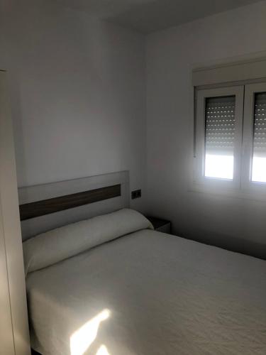 Postel nebo postele na pokoji v ubytování Casas Juani centro 1