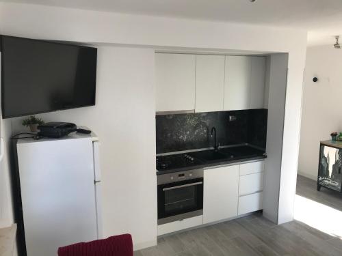Kuchyň nebo kuchyňský kout v ubytování Hvar Apartments Felix