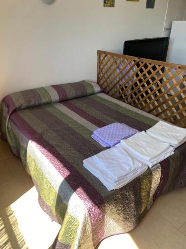 Posteľ alebo postele v izbe v ubytovaní Apartamento En Miami Platja
