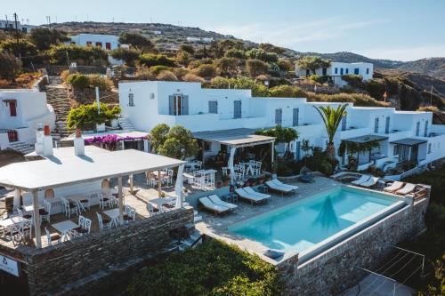 an aerial view of a villa with a swimming pool at Paradise Place Sifnos in Chrisopigi