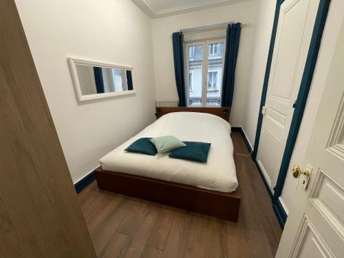 Llit o llits en una habitació de Le Vauban
