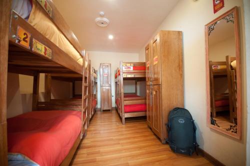 Postel nebo postele na pokoji v ubytování Pariwana Hostel Cusco