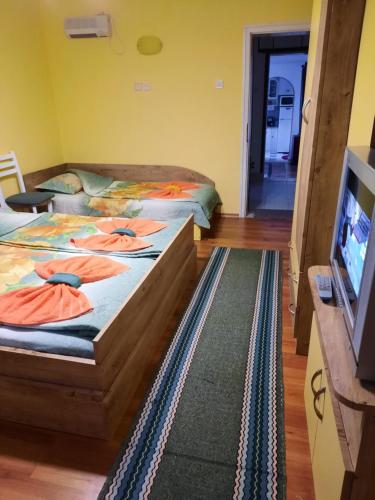 Ένα ή περισσότερα κρεβάτια σε δωμάτιο στο Guest House Lazar Raykov