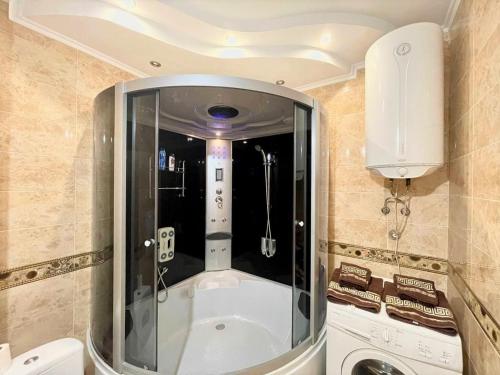 Ванная комната в LuxCityApart on Olievskaya