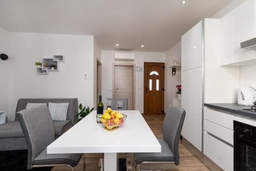 Kuchyň nebo kuchyňský kout v ubytování Apartman Palada