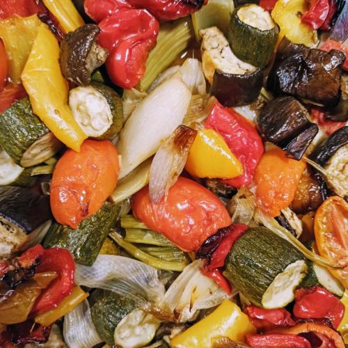 a pile of vegetables with peppers and other vegetables at Masseria LoJazzo in Ceglie Messapica