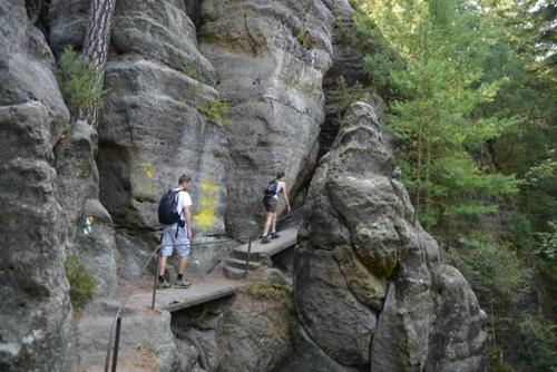 two people standing on a bridge in a rocky mountain at Villa Sunshine / Slunečna Vila in Krásná Lípa