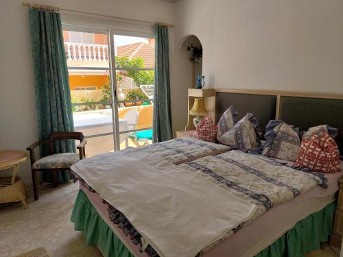 Postel nebo postele na pokoji v ubytování Casa MANUELA - Vivienda Vacacional