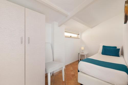 Postel nebo postele na pokoji v ubytování Hotel Tasso Suites & Spa