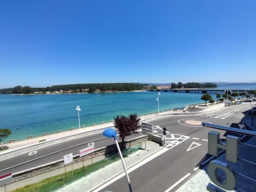 a view of the danube river and a bridge at Hotel Brisa del Mar in O Grove