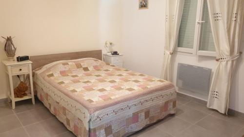 Postel nebo postele na pokoji v ubytování Villa Entrechaux