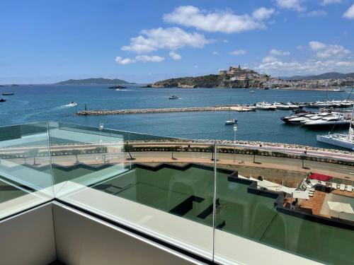 a large body of water with boats in it at Ibiza Corso Hotel & Spa in Ibiza Town