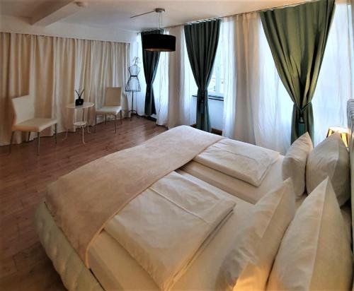 En eller flere senge i et værelse på Design Apartment BarcelonaNights