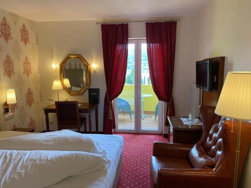 Postel nebo postele na pokoji v ubytování Hotel Kaiser Franz Josef
