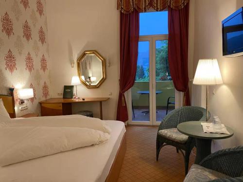 Postel nebo postele na pokoji v ubytování Hotel Kaiser Franz Josef