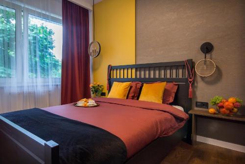 Un pat sau paturi într-o cameră la W&K Apartments - Desire Suite