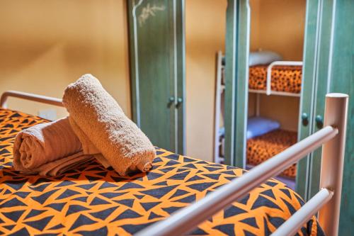 a pile of towels sitting on top of a table at Garai Etxea, casa adosada en la montaña in Arrankudiaga