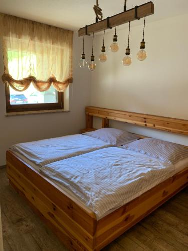 Ένα ή περισσότερα κρεβάτια σε δωμάτιο στο Katschi Lodge
