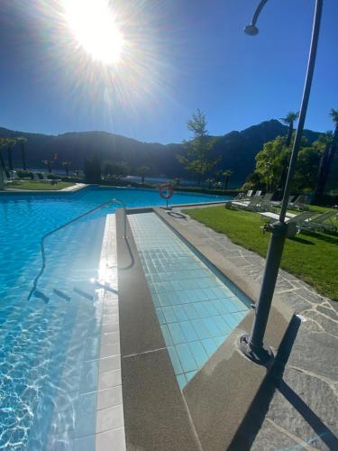 Der Swimmingpool an oder in der Nähe von Holiday On The Lake Lugano 6