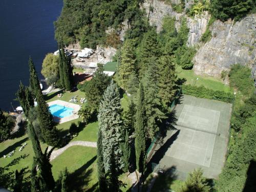 an aerial view of a golf course on the side of a mountain at Belvilla by OYO La Cava D in Pognana Lario