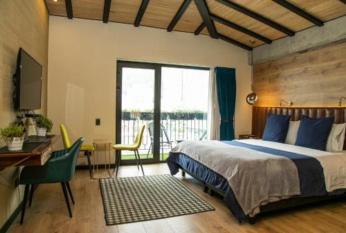 Postel nebo postele na pokoji v ubytování Viajero Bogotá Hostel & Spa