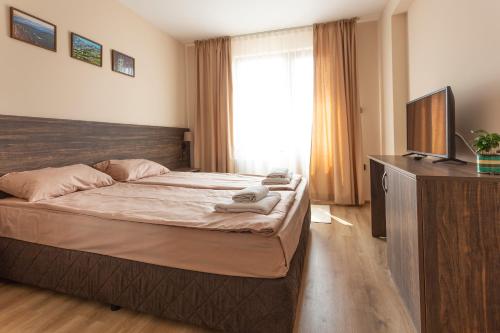 Кровать или кровати в номере Guest house Legeto