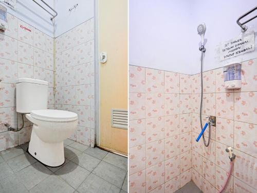 a bathroom with a toilet and a shower at OYO 90234 Dhoho Family Guest House in Kediri