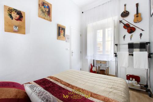 מיטה או מיטות בחדר ב-Casa Mathilde Sintra