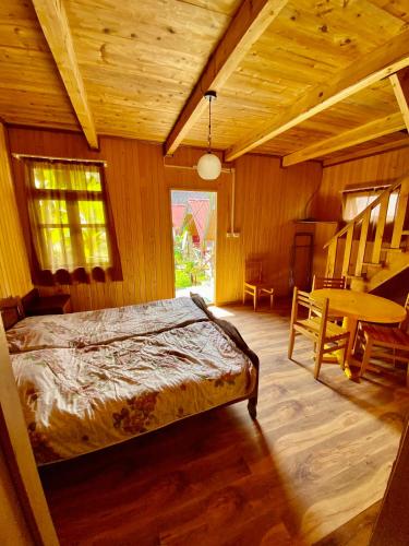 Postel nebo postele na pokoji v ubytování Cabins in Magnetiti, Ureki