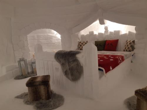 a room with a bed made out of snow at CAPANNA PRESENA in Passo del Tonale