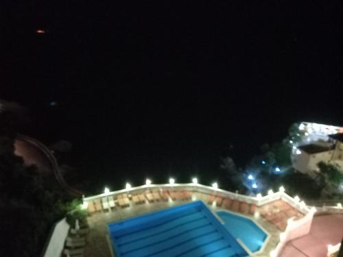 Piscina a Magic View o a prop