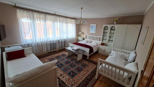 A seating area at Oázis Hotel Étterem