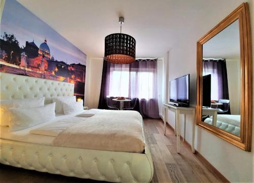 Giường trong phòng chung tại Studio Rome in der Altstadt